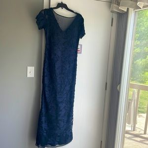 JS Collection “beautiful” rich navy blue full length, body hugging gown.